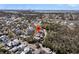 An aerial view pinpoints the neighborhood's location with its tree-lined streets and waterfront views at 740 Stucco Ln, Mount Pleasant, SC 29464