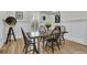 Cozy dining area with wood table, ample natural light, and stylish decor at 740 Stucco Ln, Mount Pleasant, SC 29464
