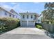 The garage is a spacious two-car garage with ample parking space and curb appeal at 740 Stucco Ln, Mount Pleasant, SC 29464