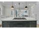 Open concept kitchen with gas cooktop on island, modern cabinetry, and views of the living area at 740 Stucco Ln, Mount Pleasant, SC 29464