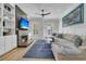 Comfortable living room featuring a fireplace, built-in shelving, and natural light at 740 Stucco Ln, Mount Pleasant, SC 29464