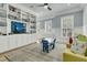 Bright playroom with built-in shelves, play table, and inviting decor at 740 Stucco Ln, Mount Pleasant, SC 29464
