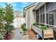 Charming screened porch opens up to a beautiful fenced backyard at 8095 Old London Rd, North Charleston, SC 29406