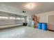 Spacious garage with epoxy floor and storage space for tools and equipment at 8095 Old London Rd, North Charleston, SC 29406