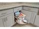 Kitchen features pull out shelving in corner cabinet at 8095 Old London Rd, North Charleston, SC 29406