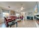 Spacious living room features hardwood floors, vaulted ceilings, and stylish leather furnishings at 8095 Old London Rd, North Charleston, SC 29406