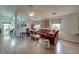 Open-concept living area featuring hardwood floors, neutral walls and ample natural light and stylish furniture at 8095 Old London Rd, North Charleston, SC 29406