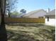 Fully fenced backyard with established grass at 8311 Whitehaven Dr, North Charleston, SC 29420