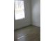 Bedroom with natural light and laminate flooring, perfect for a cozy retreat at 8311 Whitehaven Dr, North Charleston, SC 29420