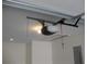 Image of garage ceiling with door opener and light at 8311 Whitehaven Dr, North Charleston, SC 29420