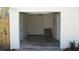 Spacious garage featuring a door to the backyard and ample storage space at 8311 Whitehaven Dr, North Charleston, SC 29420
