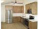 Modern kitchen featuring stainless steel appliances, bright countertops, and ample cabinetry at 8311 Whitehaven Dr, North Charleston, SC 29420