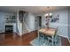Charming dining area with stylish decor, adjacent to the staircase and fireplace at 1002 Elm Hall Cir, Summerville, SC 29483