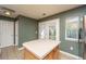 Kitchen island with a stone countertop and wooden cabinets at 1002 Elm Hall Cir, Summerville, SC 29483