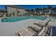 Beautiful community pool with lounge chairs and nearby residences at 1002 Elm Hall Cir, Summerville, SC 29483