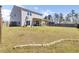 Large backyard features covered patio and plenty of space for outdoor activities at 101 Corvus Ct, Summerville, SC 29486