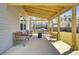 Covered patio with an outdoor kitchen with seating area, great for entertaining at 101 Corvus Ct, Summerville, SC 29486