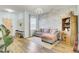 Cozy living room with stylish decor, including a comfortable sofa and a decorative brick wall at 101 Corvus Ct, Summerville, SC 29486