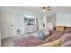 Comfortable living room with a large sectional, a modern dresser, and a wall-mounted TV at 101 Corvus Ct, Summerville, SC 29486