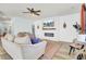 Bright living room features a fireplace, ceiling fan, and neutral colors at 101 Corvus Ct, Summerville, SC 29486