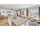 Bright open concept kitchen, dining, and living space with a modern design at 101 Corvus Ct, Summerville, SC 29486