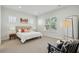 Bright bedroom with a cozy bed, bedside tables, and a window with natural light at 1028 Harriman Ln, Charleston, SC 29492