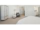 Bedroom featuring an ornate armoire, reading nook, and ensuite bathroom at 1028 Harriman Ln, Charleston, SC 29492