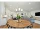 Open-concept living space with views of the kitchen, dining area, and living room at 1028 Harriman Ln, Charleston, SC 29492