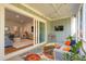 View from a screened porch to the living room through sliding glass doors, blending indoor-outdoor living at 1028 Harriman Ln, Charleston, SC 29492