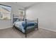 Cozy bedroom featuring a wrought iron bed frame and neutral decor at 1144 Wading Point Blvd, Huger, SC 29450