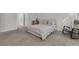 Spacious bedroom with a king bed, en-suite bathroom and comfortable seating with natural light at 1144 Wading Point Blvd, Huger, SC 29450