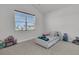 Bright bedroom with a view, showcasing playful decor and ample natural light at 1144 Wading Point Blvd, Huger, SC 29450