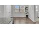 Cozy dining area near the kitchen with window and a potted plant at 1144 Wading Point Blvd, Huger, SC 29450