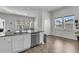 Open concept kitchen and dining area with an island at 1144 Wading Point Blvd, Huger, SC 29450