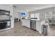 Open concept kitchen with an island, and easy access to living and dining area at 1144 Wading Point Blvd, Huger, SC 29450