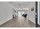 Spacious living room with hardwood floors, fireplace, and lots of natural light at 1144 Wading Point Blvd, Huger, SC 29450
