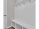 Well-organized mudroom with built-in bench, cubbies, and coat hooks at 1144 Wading Point Blvd, Huger, SC 29450