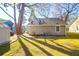 Spacious backyard with mature trees, shed, and sunny lawn great for relaxing or outdoor activities at 115 Tennyson Way, Summerville, SC 29486