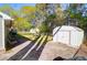 This spacious backyard has a shed and seating, offering ample space for outdoor enjoyment at 115 Tennyson Way, Summerville, SC 29486