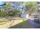 Spacious backyard features a shed, fire pit and plenty of space for outdoor activities at 115 Tennyson Way, Summerville, SC 29486