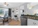 Eat-in kitchen dining area with views of the backyard through a large window at 115 Tennyson Way, Summerville, SC 29486
