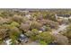 An aerial view of a residential neighborhood featuring mature trees and community pools at 1162 South Shadow Dr, Mount Pleasant, SC 29464