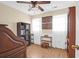 Cozy bedroom featuring a ceiling fan, wood floors, and ample natural light at 1162 South Shadow Dr, Mount Pleasant, SC 29464
