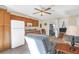 Comfortable living area with a ceiling fan, wooden cabinets, modern appliances, and view to the outdoor area at 1162 South Shadow Dr, Mount Pleasant, SC 29464