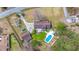 Aerial view showcasing the house, in-ground pool, detached garage, and spacious yard at 117 Hartin Blvd, Summerville, SC 29486