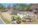 Aerial view showcasing the home, detached garage, private pool area, and lush landscaping at 117 Hartin Blvd, Summerville, SC 29486