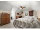 Comfortable bedroom with a bed, a ceiling fan, a dresser, a printer on a desk, and natural light at 117 Hartin Blvd, Summerville, SC 29486
