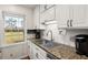 Bright kitchen with stainless steel appliances and granite countertops at 117 Hartin Blvd, Summerville, SC 29486
