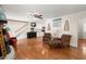 Spacious living room featuring hardwood floors and comfortable seating arrangement at 117 Hartin Blvd, Summerville, SC 29486