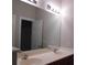 Bathroom featuring a double sink vanity and large mirror at 1204 Grove Park Dr, Charleston, SC 29414